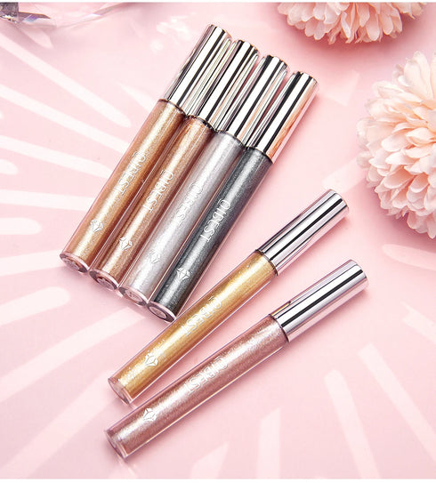 Collection of shimmer lip gloss tubes showcasing various sparkling colors.
