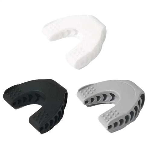 Fitness jaw trainer placed near the mouth, intended for daily exercises to sculpt jawline and tighten neck area.