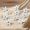 Set of 10 mini flower hair claw clips in vibrant colors, perfect for everyday hairstyles.