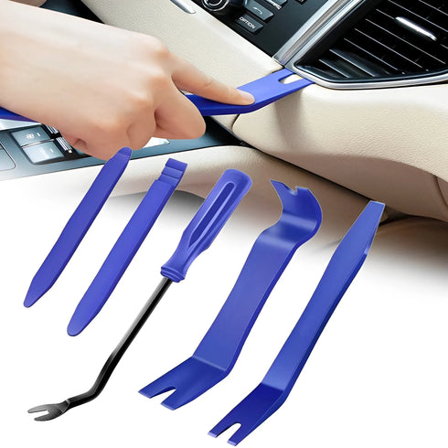 Car disassembly tool kit with various plastic trim tools for dashboard and stereo panel removal.