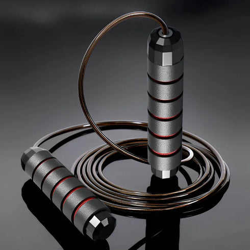 Adjustable steel wire jump rope with ergonomic handles for fitness training.