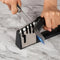 Close-up of the 4-segment knife sharpener with non-slip base, designed for home kitchen use and easy portability.