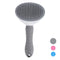 Pet hair removal comb for cats and dogs with ergonomic handle.