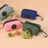 Pet poop bag holder in durable canvas, designed for on-the-go use.