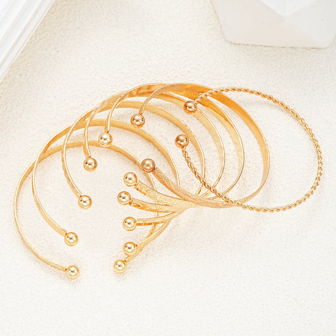 7 Pcs/Set Punk Gold Bracelets – Heart Print & Metal Design