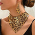Elegant jewelry set featuring leopard print bib necklace and matching dangle earrings.